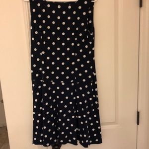 Sleeveless navy and white polka dot dress